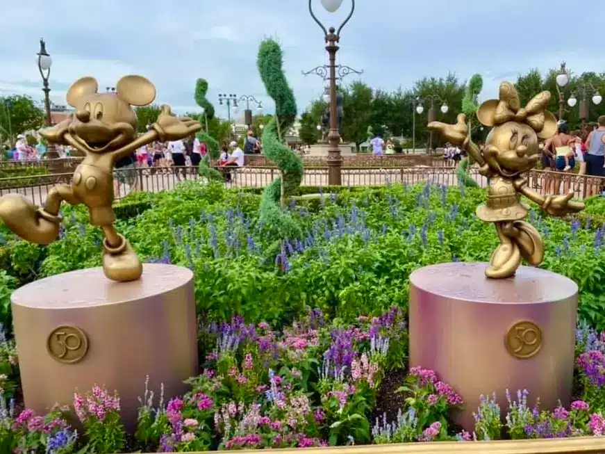 Mickey and Minnie golden Fab 50 sculptures at Magic Kingdom
